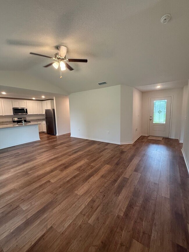 Building Photo - Stunning Brand-New 3 Bedroom+Den Home in P...