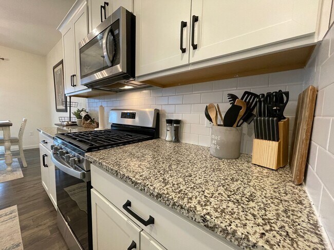 Building Photo - Live Lavishly in Harmony Ridge- Fully Furnished 5-Bedroom Dream Home with Backyard Oasis & Speake...