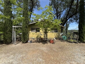 Building Photo - A gardener's delight! 3-bedroom home nestled in the countryside but close to town.