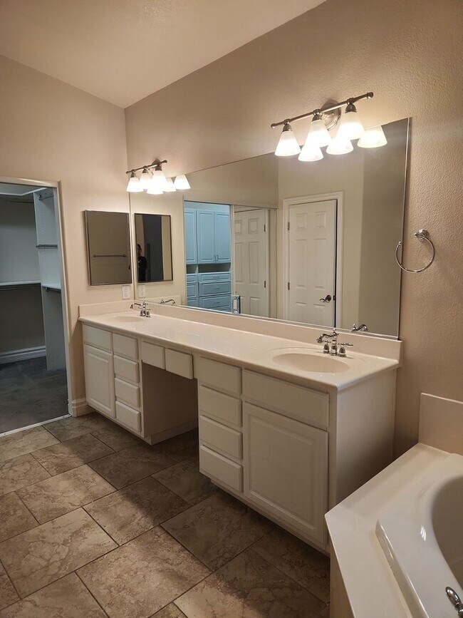 Building Photo - A Stunning 4 Bedroom Home with a Sparkling Pool