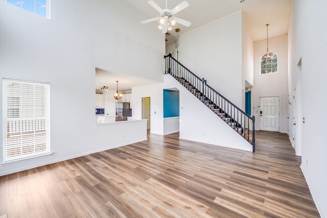 Building Photo - Enjoy Riverfront Living! Spacious 4-Bedroo...
