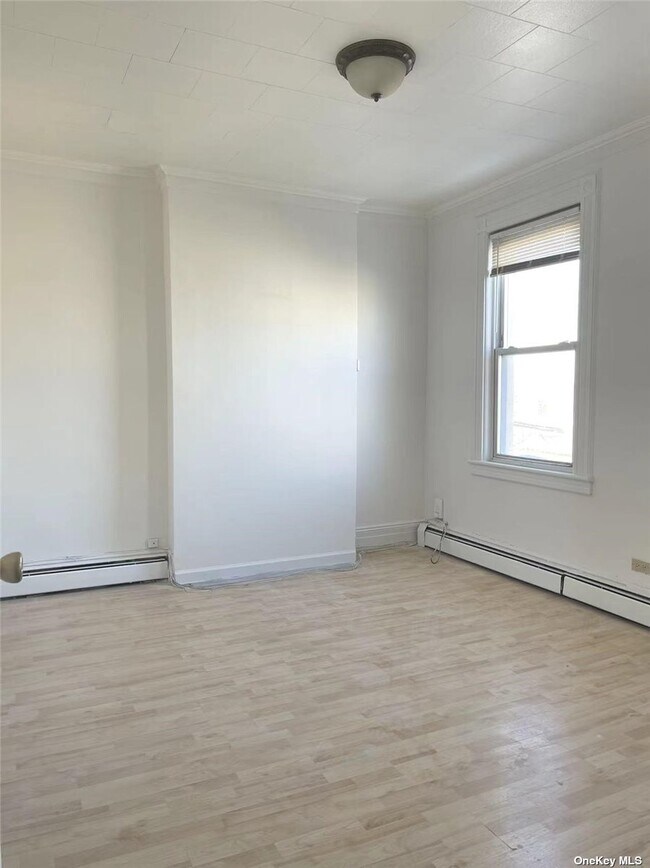 Building Photo - 60-12 56th Dr