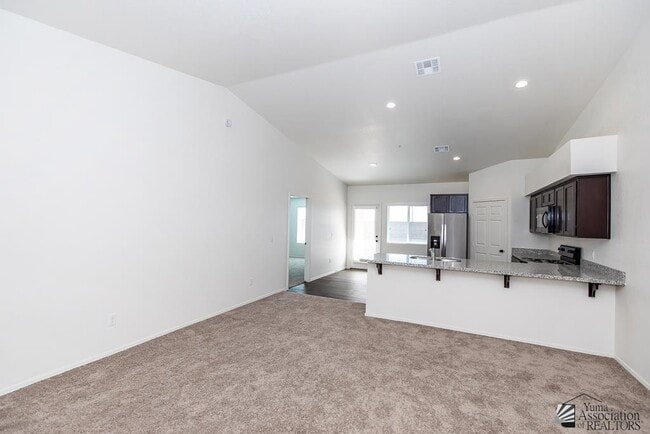 Building Photo - 7171 E 38th Ln