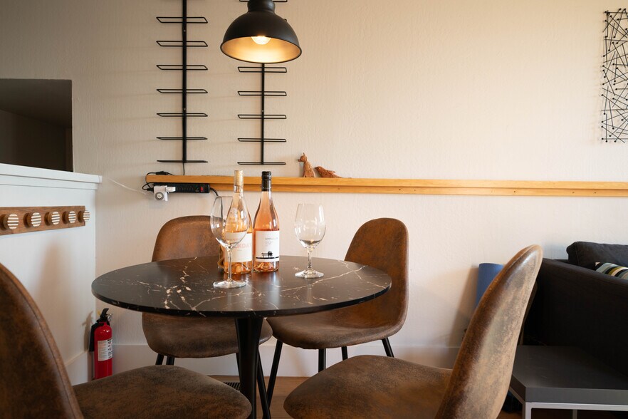 Dining area with wine shelves - 5955 Fern St