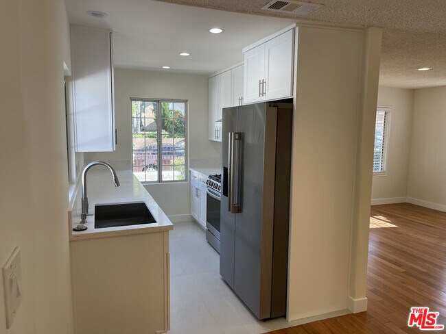 Building Photo - 10631 Tinker Ave