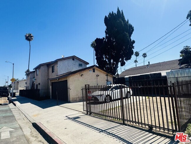 Building Photo - 7704 S Grand Ave