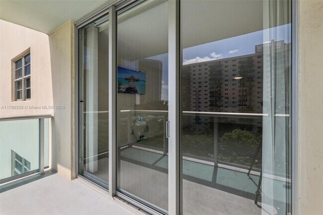 Building Photo - 19390 Collins Ave