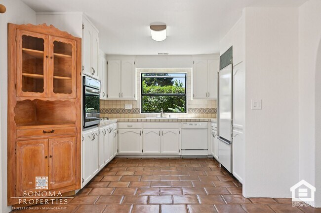 Building Photo - Southwestern Charm Meets Modern Comfort — 2BR/2BA Condo with Access to Shared Pool!