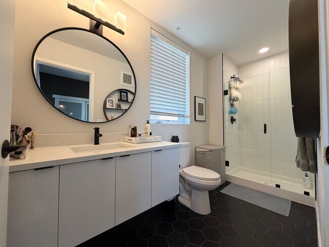 Building Photo - Top-Floor Corner Condo with Downtown Views — Stylish, Pristine, and Steps From Everything