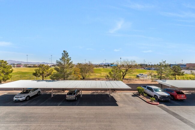 Building Photo - Bright & Stylish Condo with Fireplace and Private Balcony in a Resort-Style Community!