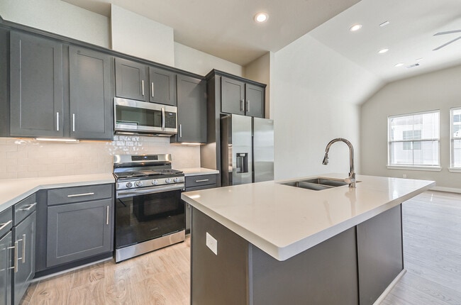 8 / 20Kitchen features top of the line Samsung appliances - 1108 Olivier Ln