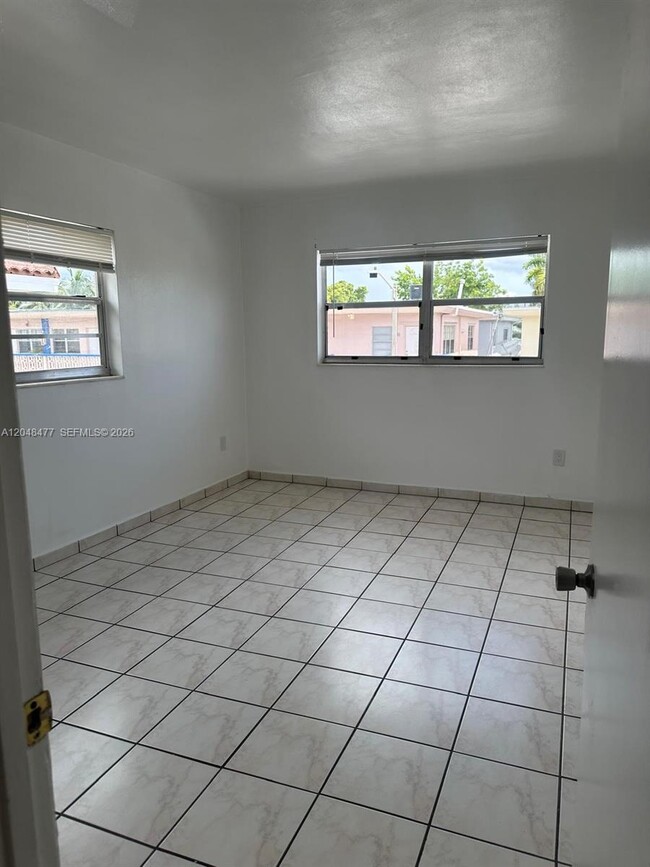 Building Photo - 7860 Harding Ave