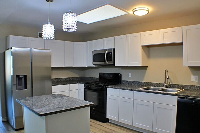 Building Photo - Beautiful 4-Bedroom Move-in Ready Home