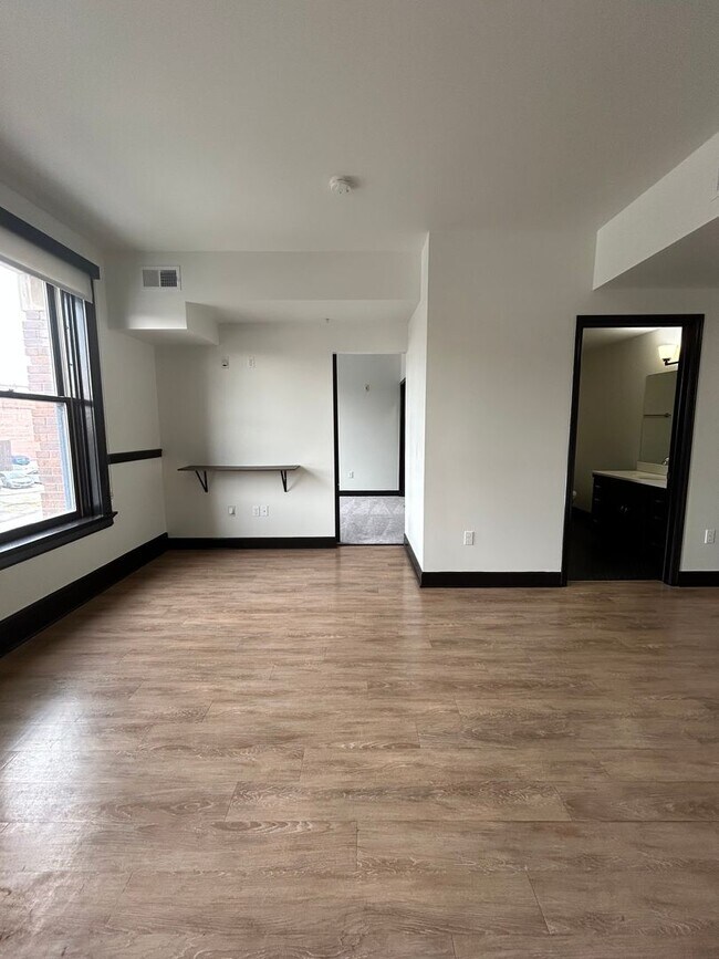 Building Photo - Sleek Downtown Living with a Modern Edge