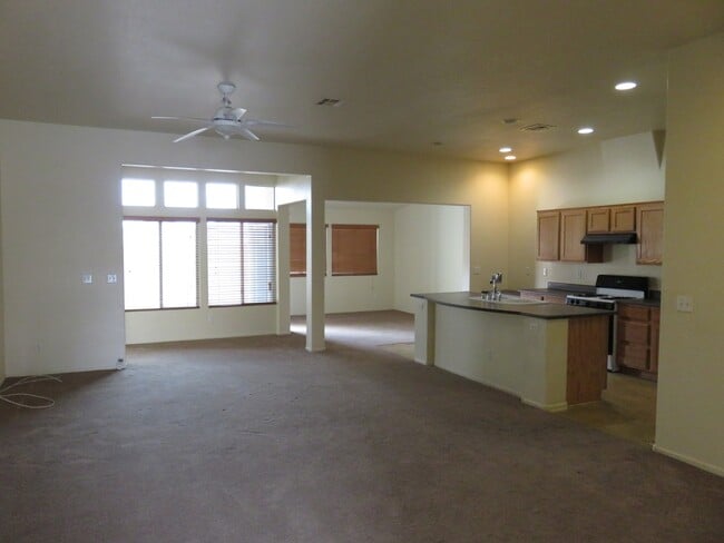 Building Photo - Huge family room with kitchen nicely tucked in the middle.