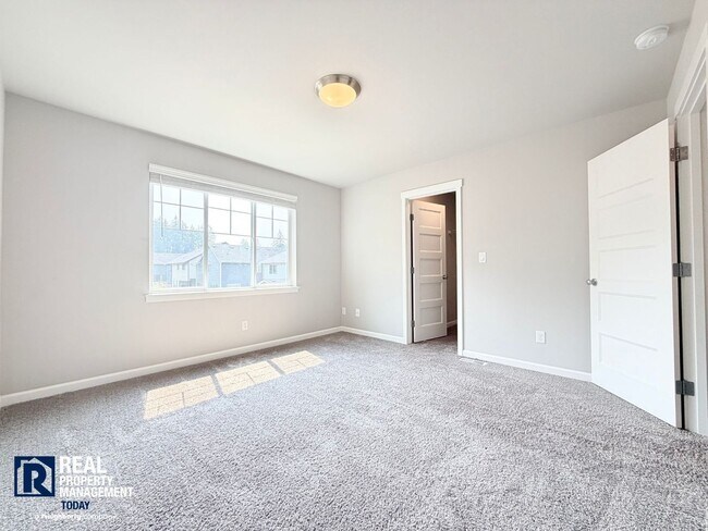 Building Photo - Easy JBLM Commute Like-New 4BR Home with 3-Car Garage & Bonus Office