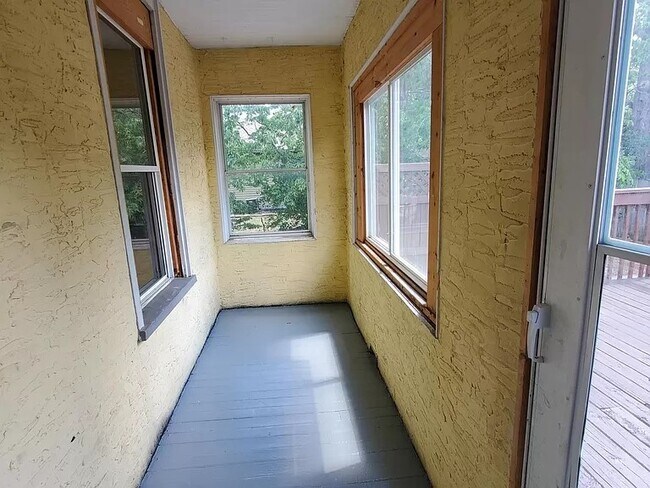 Porch entry from the kitchen and outdoor deck - 576 Bay St