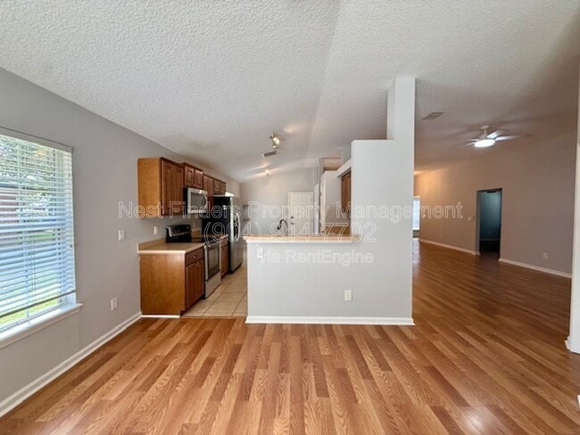 Building Photo - 4509 Deep River Way E