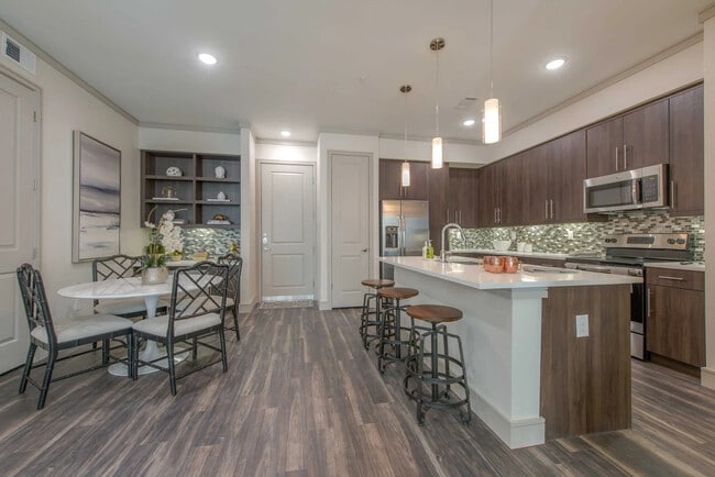 Building Photo - Experience the Art of Fine Apartment Living!