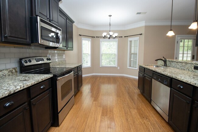Building Photo - Elegant All-Brick 4 Bedroom Home on a Quie...