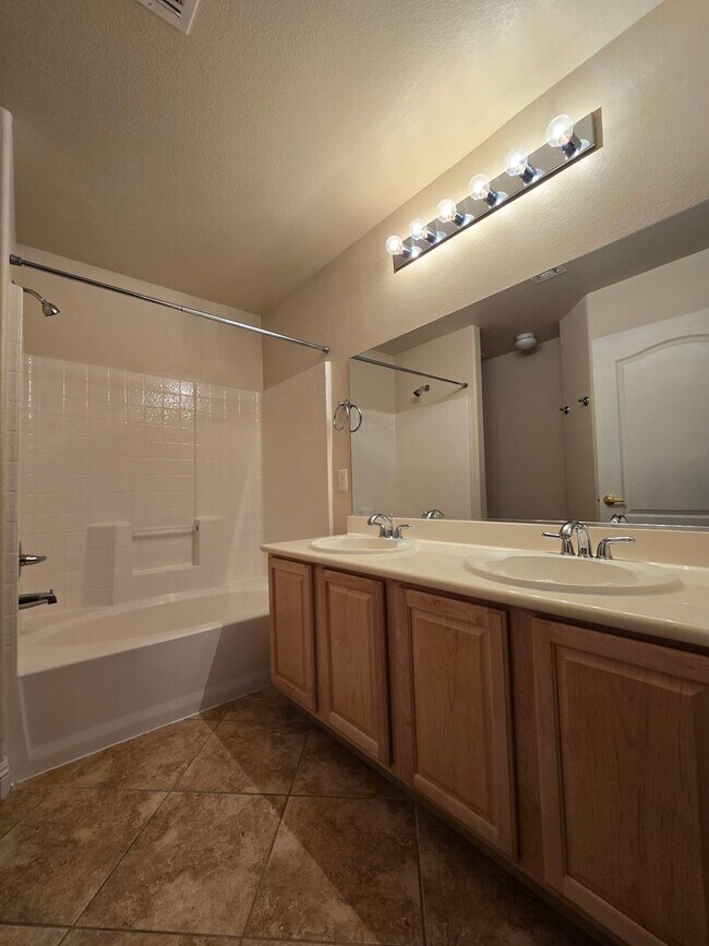 Building Photo - A Fabulous 3 Bedroom, 2.5 Bathroom, 2 Car Garage Townhome in NW Las Vegas