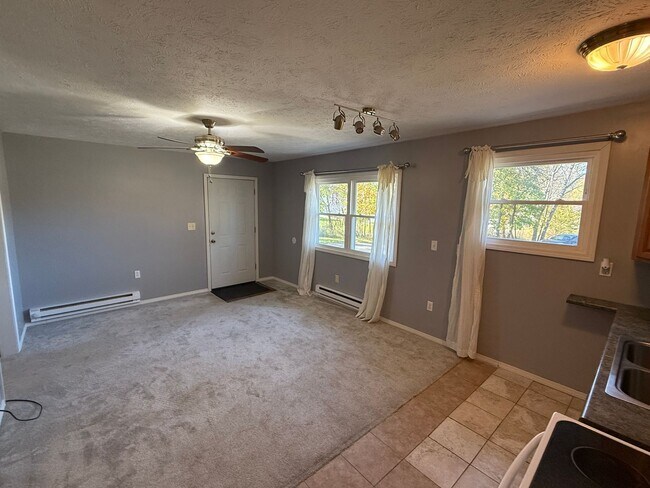 Building Photo - Spacious 4-Bedroom Property with In-Law Su...