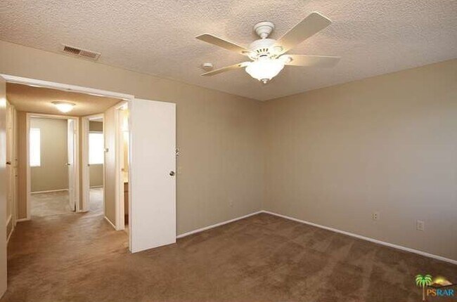 Building Photo - Spacious 4-Bedroom Condo in Indian Canyon ...