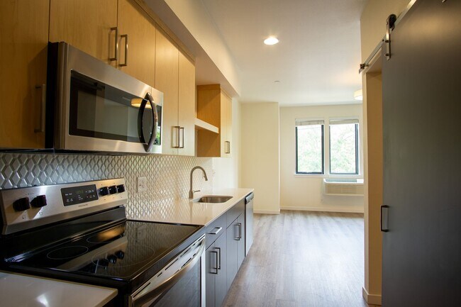 Building Photo - John's Landing-Modern, Spacious Studio Liv...