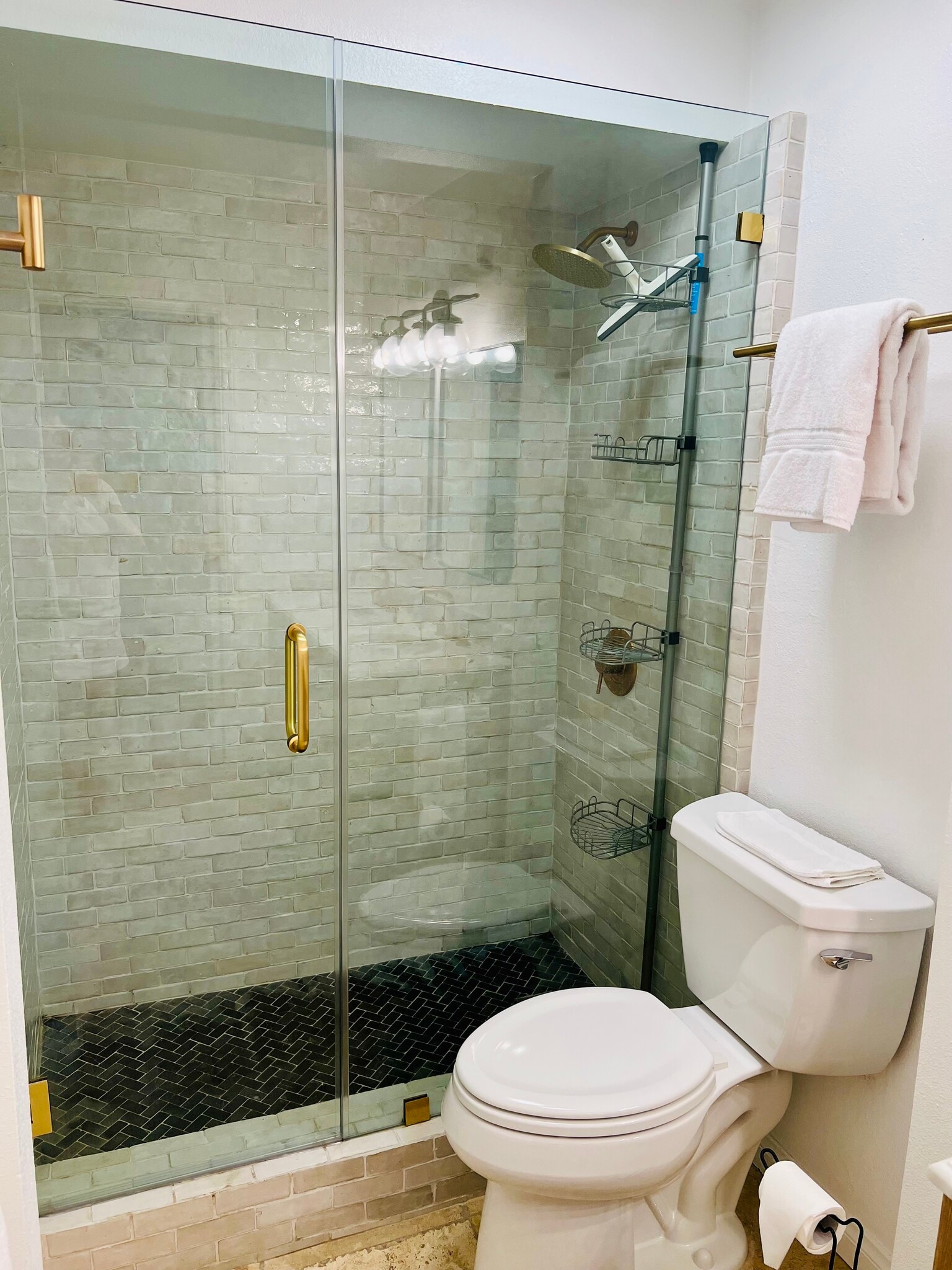 Primary bathroom shower & new commode - 24 Westwind St