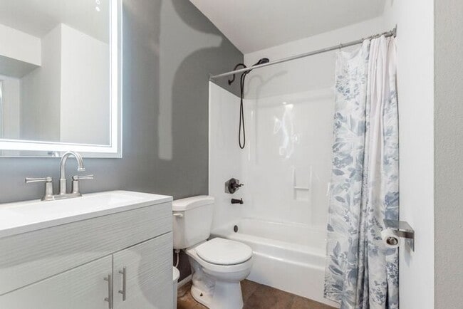 Building Photo - Discover this charming two-story townhome