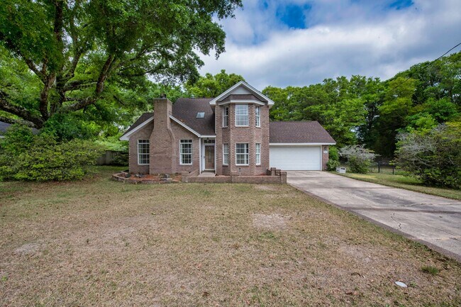 Building Photo - Spacious 3BR Retreat with Soaring Ceilings & Screened Porch