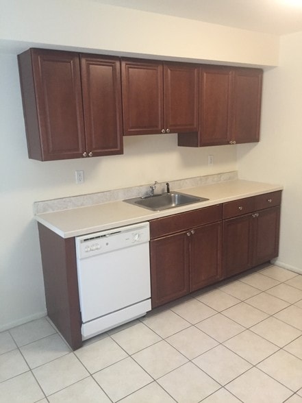 Kitchen with dishwasher microwave and stove with oven - 1408 Edison Glen Terrace