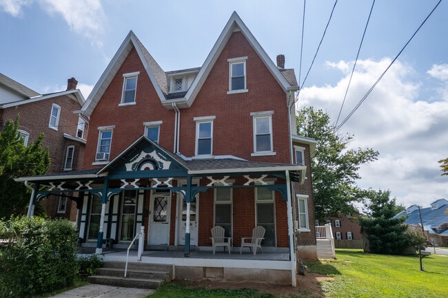 Additional outside photos. Will be planting grass early fall to cover grading. - 506 Washington St
