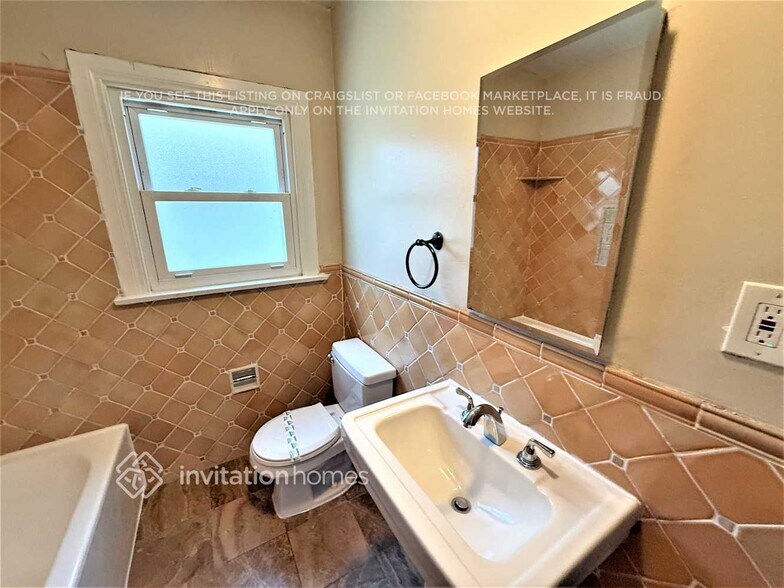 Building Photo - 6046 6th Ave