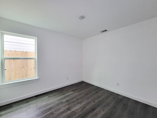 Building Photo - This newly constructed 3-bedroom, 2-bathroom unit offers modern living with 1,150 sq ft of space....