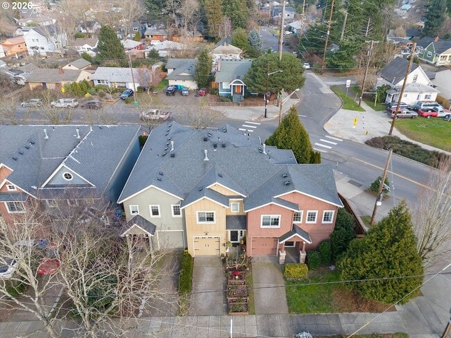 Building Photo - Spacious 3 Bedroom Townhome with Stainless Steel Appliances, Attached Garage & Open Layout