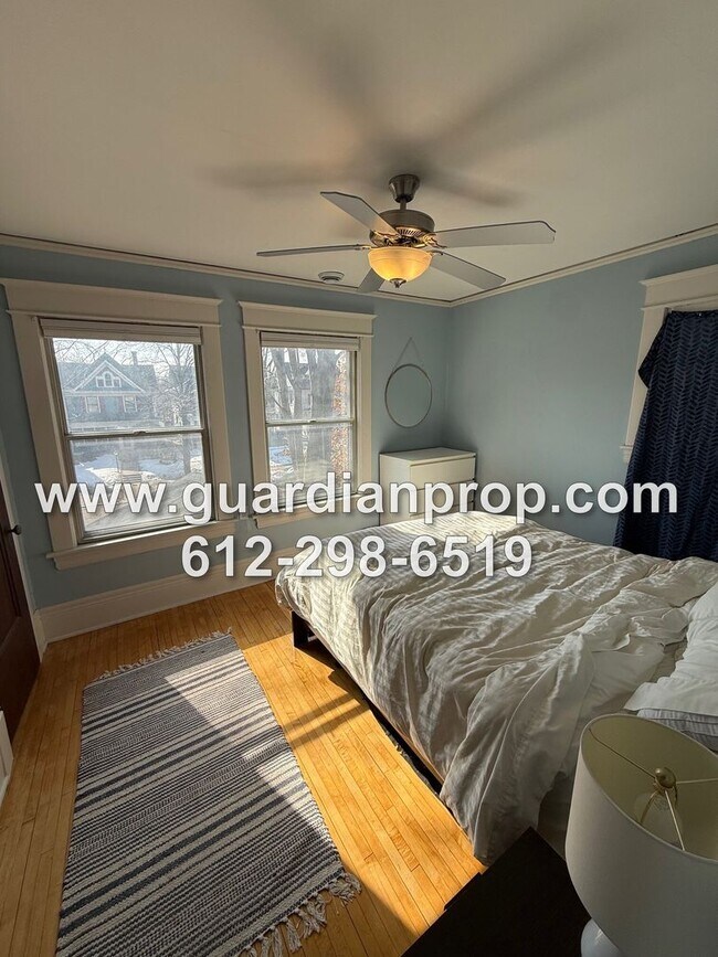 Building Photo - Merriam Park House Available May 1st, Updated Kitchen, Office, Fenced Yard, 2 Car Garage