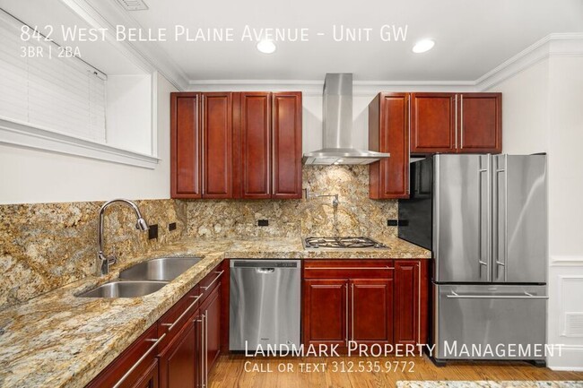Building Photo - 842 W Belle Plaine Ave