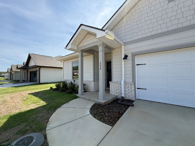 Building Photo - "NEWLY BUILT- Spacious 4-Bedroom Haven with Granite Elegance and Cozy Fireplace in Harvest"