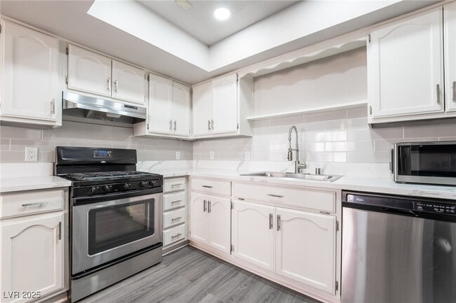 Building Photo - 6643 W Tropicana Ave