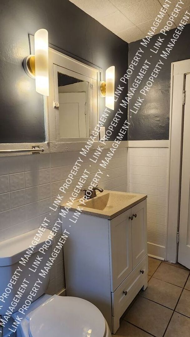 Building Photo - Charming Fully Renovated 4-Bedroom Home in...