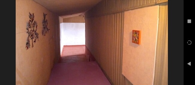 Hallway to third bedroom or family room - 3 E Avenue B