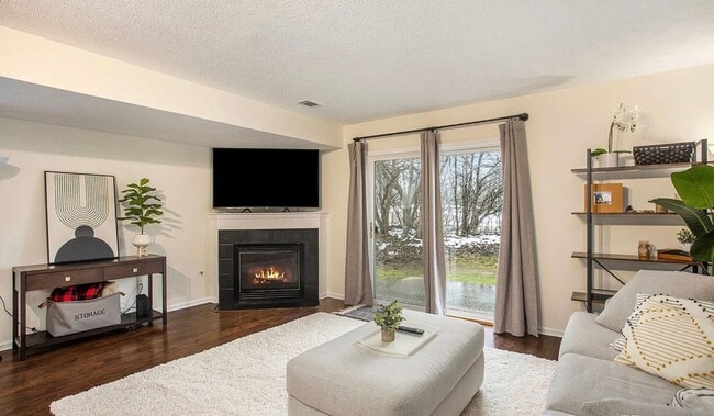 Building Photo - Charming 3-Bedroom End Unit Condo – Prime ...