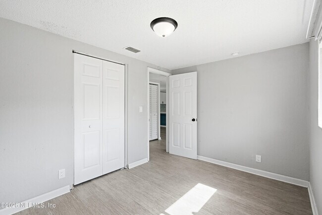 Building Photo - 7386 Dostie Dr E