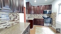 Building Photo - FRESHLY GUT RENOVATED VERY BRIGHTAND BEAUT...