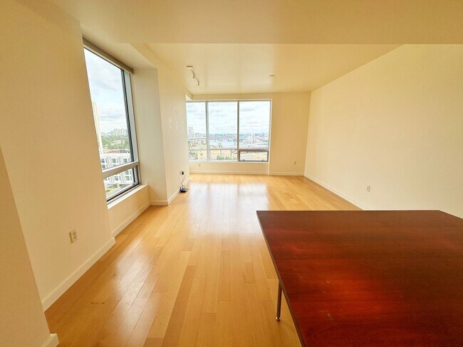Building Photo - Spacious, open-concept 1-bedroom 7th floor condo in the South Waterfront District.