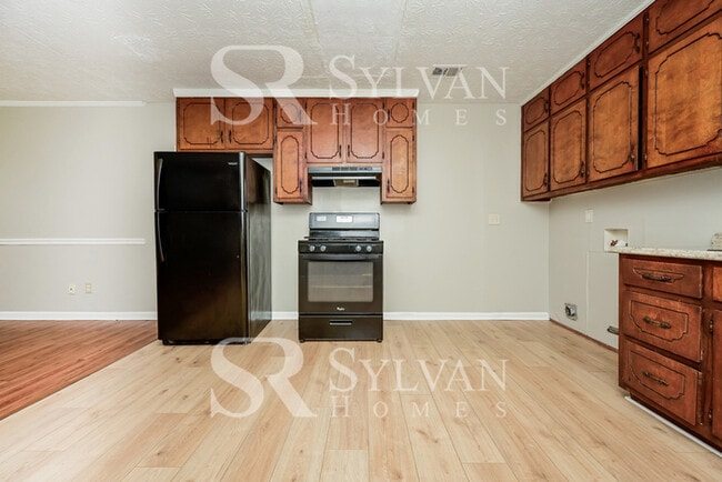 Building Photo - The living is easy in this 3 bedroom, 2 bathroom home