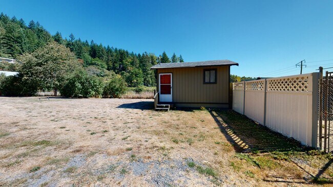 Building Photo - May Valley Road business opportunity available - 2 bedroom 1 bath home with carport & office and ...