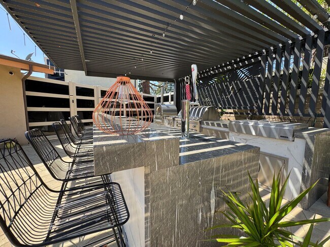 Building Photo - Luxurious Oasis with Resort-Style Pool and...