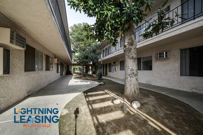 Building Photo - 8123 Langdon Ave